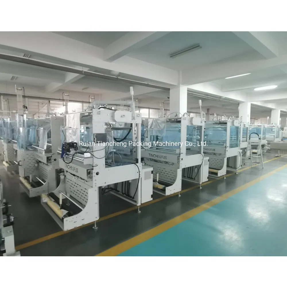 Hot Sale Fully Automatic Plastic Lids Packing Machine Case Machine Box Tape Sealing Machine